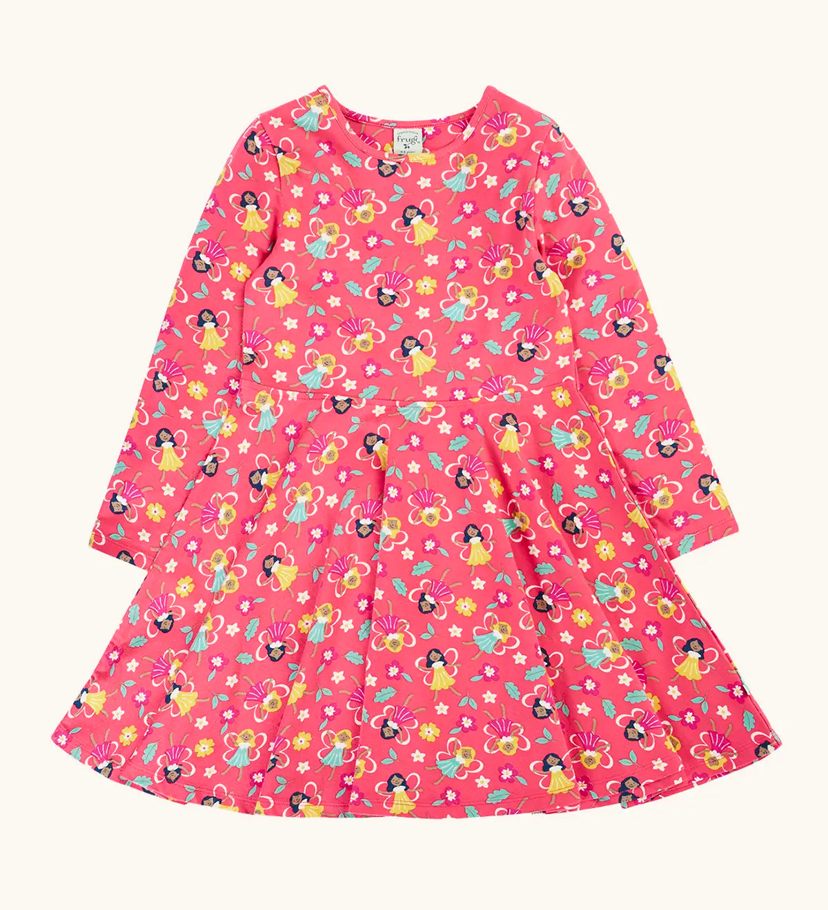 Frugi GOTS organic cotton sofia skater dress in fairy flutter. Pink background with colourful fairy print featuring flowers and leaves.