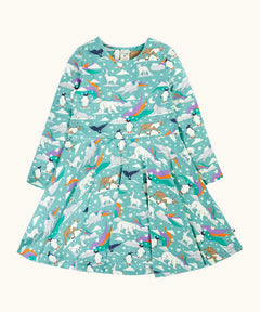 Frugi GOTS organic cotton sofia skater dress in polar aurora. Blue green background with and all over print featuring polar animals among star and colourful swishes. 