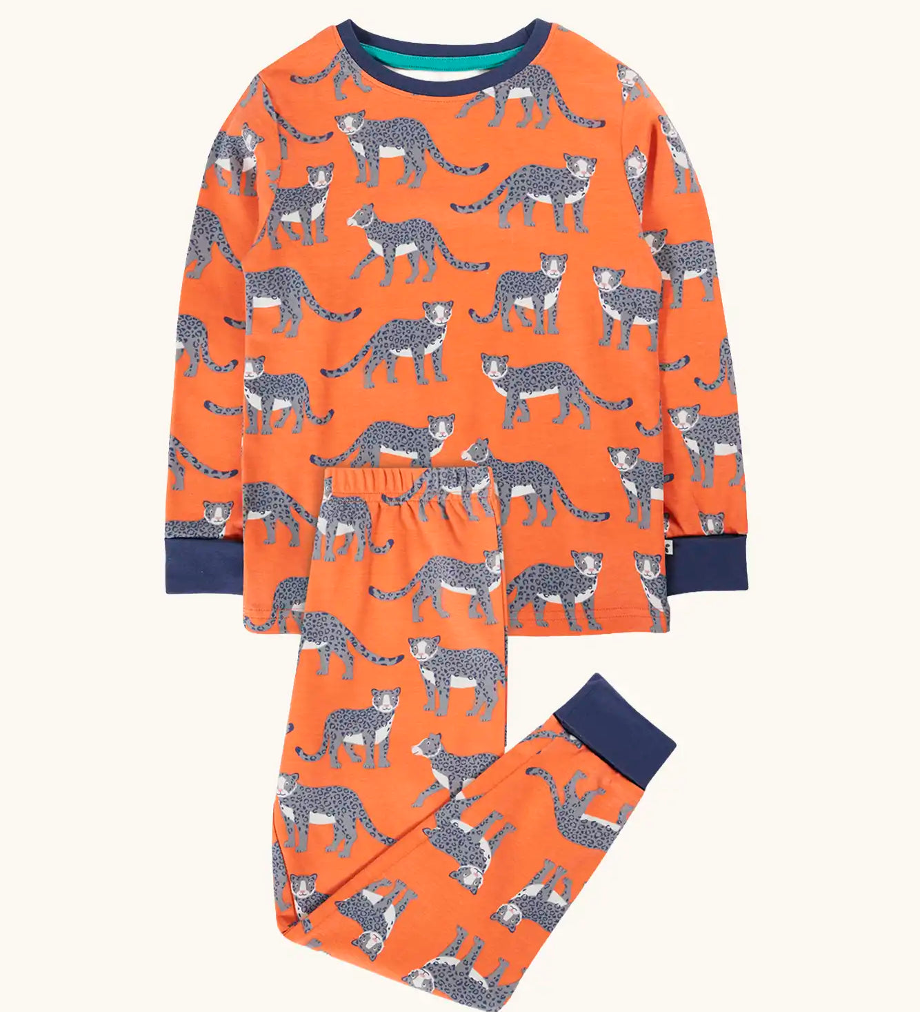 Frugi organic cotton sundown kids long sleeve pyjama set with a leopard leap print. Orange long sleeved pyjama top and matching trousers featuring an all over repeat print of grey leopards with navy cuffs and neck trim.