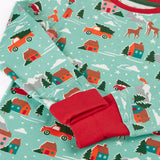 Close up of the red extendable fold over cuffs on the Frugi organic cotton sundown kids long sleeve pyjama set with a winter drives print.