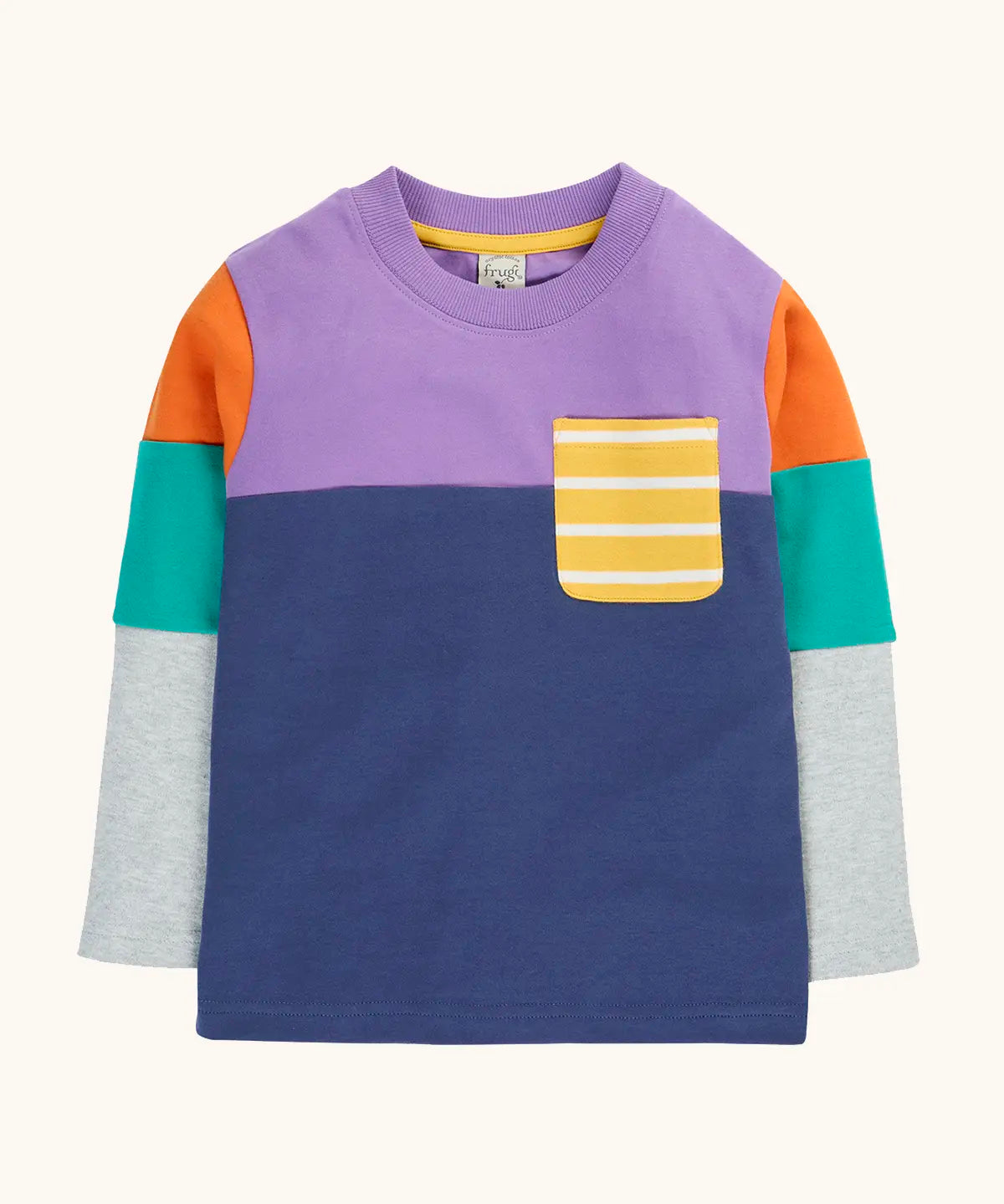 Frugi organic cotton kids long sleeved tregony hotchpotch top. Purple top with navy bottom with orange, teal and grey block colour sleeves with a yellow striped chest pocket. 