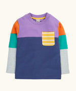 Frugi organic cotton kids long sleeved tregony hotchpotch top. Purple top with navy bottom with orange, teal and grey block colour sleeves with a yellow striped chest pocket. 