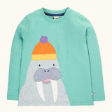 Frugi organic cotton adventure circular long sleeved top in light moss green with a walrus wearing a bobble hat applique on the front. 