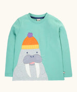 Frugi organic cotton adventure circular long sleeved top in light moss green with a walrus wearing a bobble hat applique on the front. 