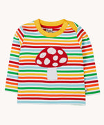A Frugi orion fun guys applique child's top made from organic cotton. The top has a red mushroom applique on the front, long sleeves and rainbow coloured breton stripes.