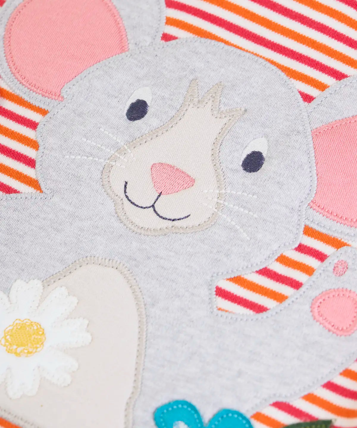 Frugi long sleeve organic cotton top with a pink, orange and white sunset stripe showing close up of the mouse applique