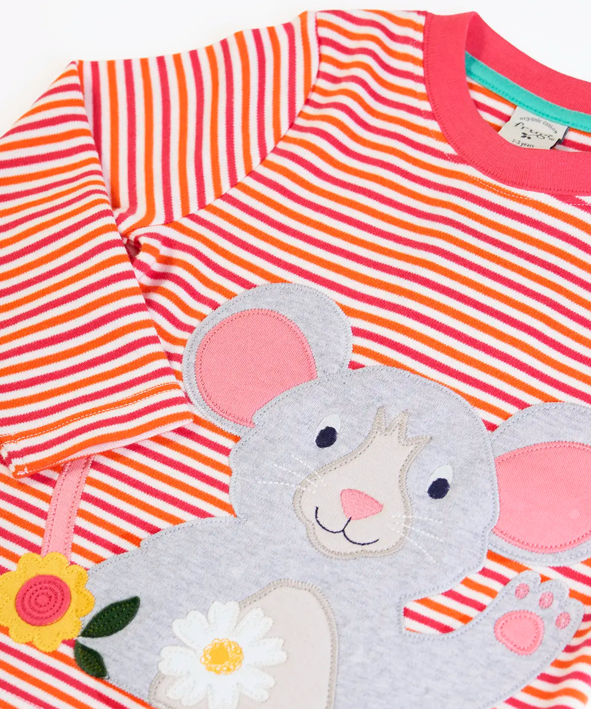 Frugi long sleeve organic cotton top laid flat showing close up of the mouse applique on pink, orange and white striped organic cotton fabric