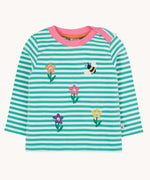 Frugi Orion flowers long sleeved kids top. This organic cotton kids top features a dragon stripe breton stripe background with frour coloured, embroidered flowers and a bee on the front