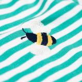 A close up of the embroidered bee detail on the front of the Frugi Orion flowers long sleeved kids top. 