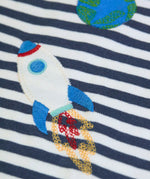 Frugi GOTS 100% organic cotton kids long sleeve top in navy and white stripes showing a close up of a rocket applique 