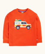 Frugi owen children's organic cotton long sleeved orange with a mountain rescue vehicle on the front. 