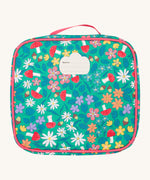 The back of the Frugi kids pack a lunch bag in wild woods showing the name tag patch on the top. 