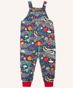 Frugi parsnip organic cotton dungaree in navy with an all over explore the stars print, red fold up leg cuffs.