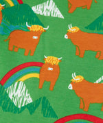 Close up of the cows on the Frugi parsnip joggers in palm green with highland coos cow print. 