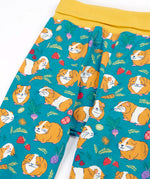 Frugi GOTS organic cotton parsnip pants in teal with a repeating guinea pig print and a yellow elasticated waistband for extender wear