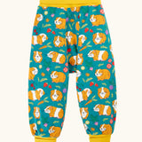 Frugi parsnip pants blue organic cotton kids trousers with all over guinea pig muddle print with yellow waist and leg cuffs.