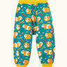 Frugi parsnip pants blue organic cotton kids trousers with all over guinea pig muddle print with yellow waist and leg cuffs.