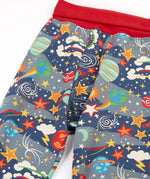 Frugi GOTS organic cotton parsnip pants in navy with outer space themed prints with a red fold up waist band for extender wear