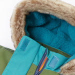 A close up of the Frugi khaki penhale colourblock parka showing the soft furry hood with blue fleece inner liner and velcro fastener for a secure fit. Features a full length zip.