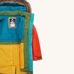 Frugi kids penhale Khaki parka- A long length thick coat. Features a blue fleece inner liner for warmth and a name tag stitched on the inside               