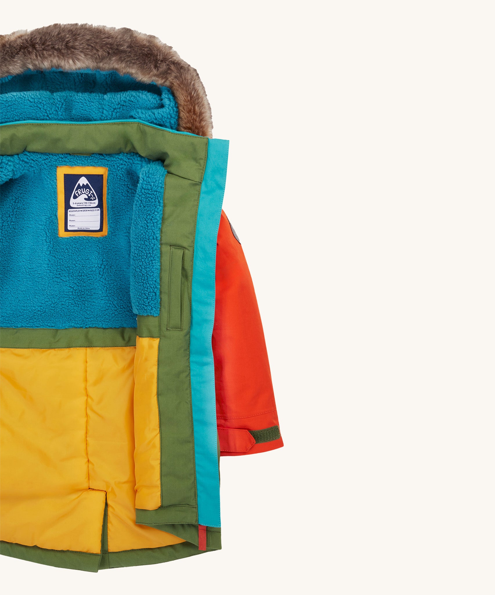 Frugi kids penhale Khaki parka- A long length thick coat. Features a blue fleece inner liner for warmth and a name tag stitched on the inside               