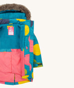 Frugi kids penhale super spot parka- A long length thick coat. Features a blue fleece inner liner for warmth and a name tag stitched on the inside      