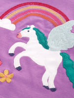 Close up of the white pegasus applique with rainbow and flowers details on the Frugi organic cotton periwinkle purple caris pegasus child's top. 