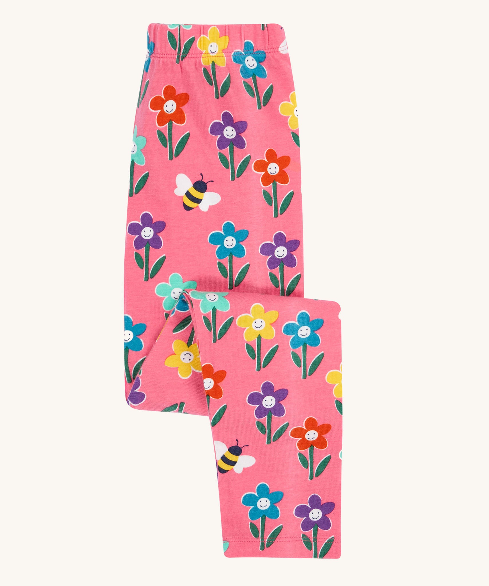 Frugi organic cotton kids Libby leggings with a fun flowers print on a pink background.