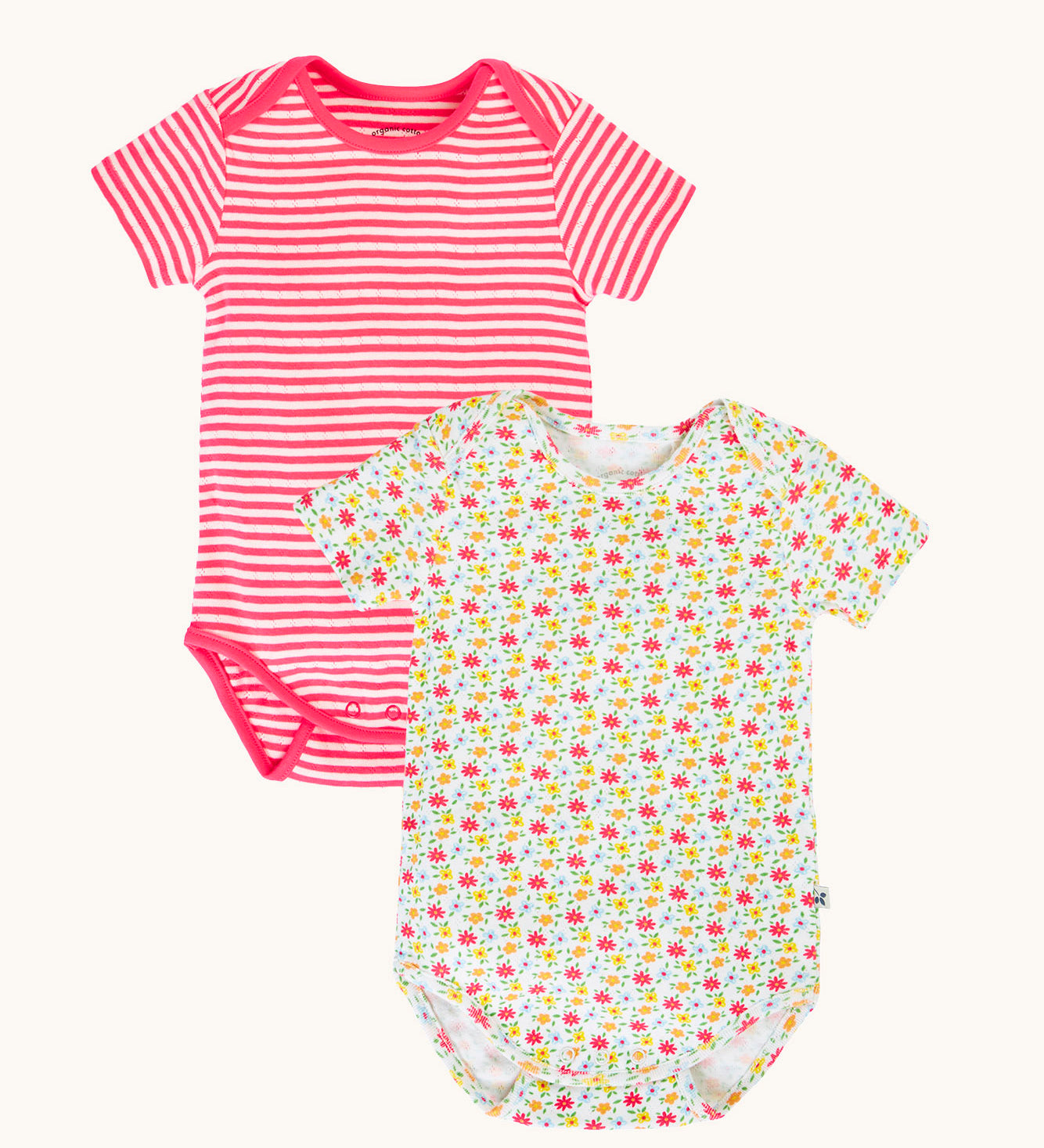 Frugi Pointelle short sleeved baby vest 2 Pack, one with a Ditsy Floral all over print the other has a pink and white stripe design.