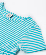A close up of Frugi Pixy Sea Moss Mini Stripe Dress, featuring popper fastenings.