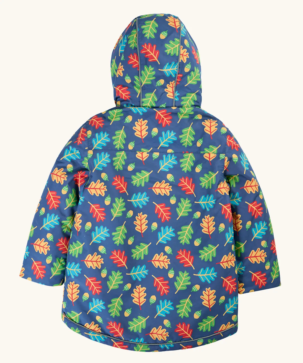 Back of Frugi children's playtime waterproof coat with a multi-coloured acorn tumble print on a navy background.
