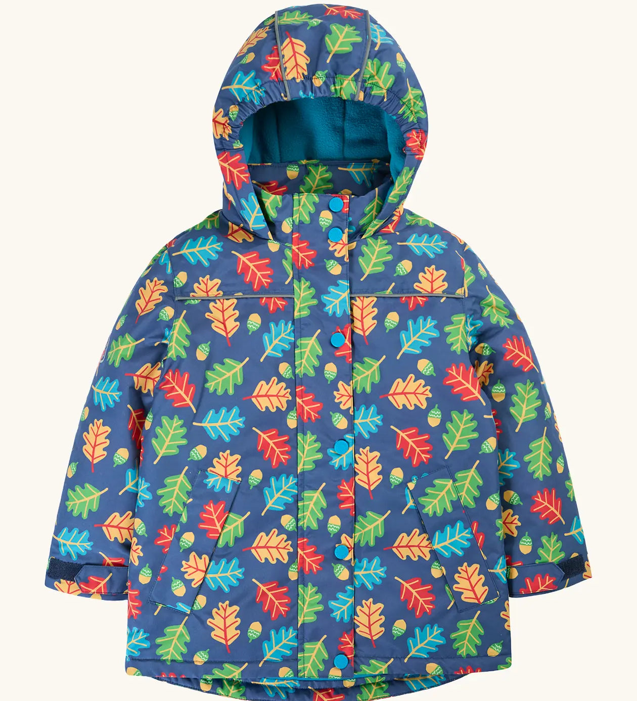 Frugi children's playtime waterproof coat with a multi-coloured acorn tumble print on a navy background.