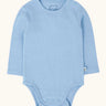 Frugi pointelle long sleeved baby body in winter sky blue. 