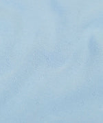 Frugi long sleeve top in sky blue organic cotton showing close up of the pointelle texture