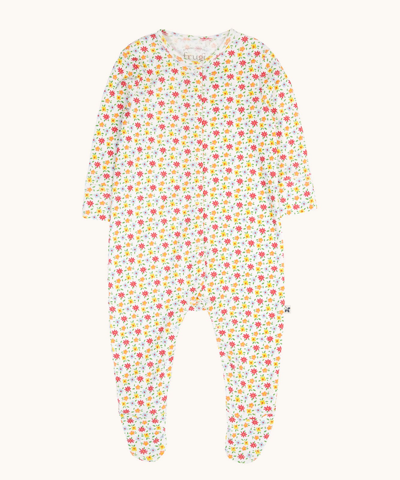 Frugi Pointelle Organic Cotton footed Babygrow with an all over Ditsy Floral print.