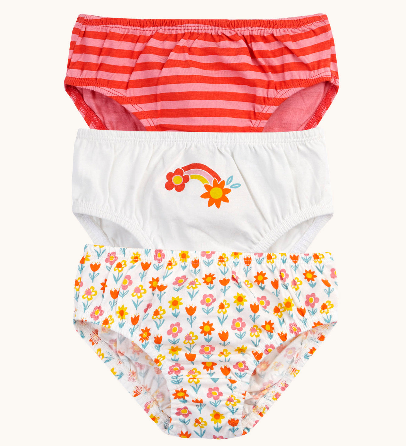 Frugi organic cotton briefs underwear multipack bloom flowers design. A 3 pack, one brief has an all over flower design, one is white with a rainbow flower graphic on the front and the other has a red and pink striped design.