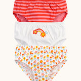 Frugi organic cotton briefs underwear multipack bloom flowers design. A 3 pack, one brief has an all over flower design, one is white with a rainbow flower graphic on the front and the other has a red and pink striped design.