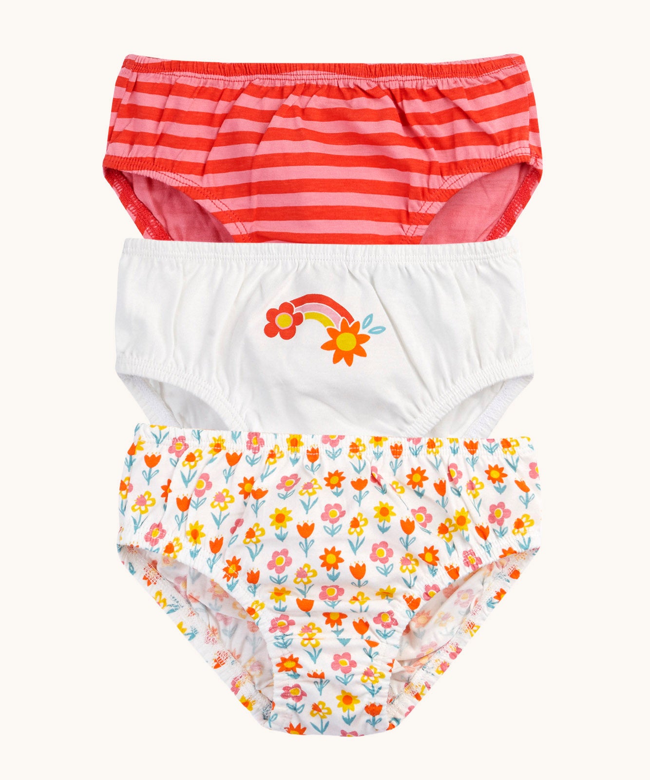 Frugi organic cotton briefs underwear multipack bloom flowers design. A 3 pack, one brief has an all over flower design, one is white with a rainbow flower graphic on the front and the other has a red and pink striped design.