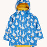 Frugi cobalt blue coloured rain jacket with all over white goose print. Yellow jersey cotton lining and an elasticated hood. 