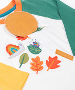 Frugi organic cotton Alfie interactive long sleeved top. The interactive element is a liftable circle that forms the head of the magnifying glass.
