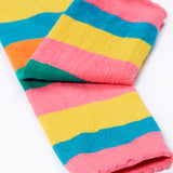 A close of of the pink coloured cuffs on the Frugi rainbow bee design organic cotton leggings footless tights.