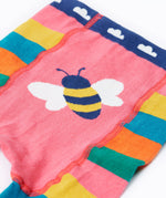 A close up of the bee on the behind of the Frugi rainbow bee design organic cotton leggings footless tights.