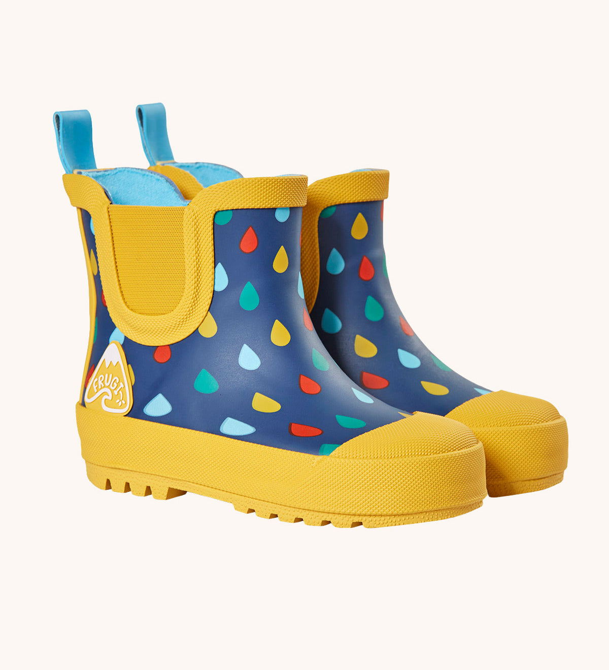Frugi rain or shine rainbow rain design short welly boots. A navy background with rainbow coloured raindrops print, yellow soles, binding, toe caps, logo badge and elasticated gussets. 