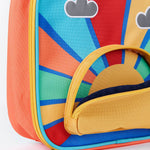 A close up of the Frugi kids pack a lunch bag in rainbow sun. Showing the yellow zip trim and opened front compartment revealing the rising sun.