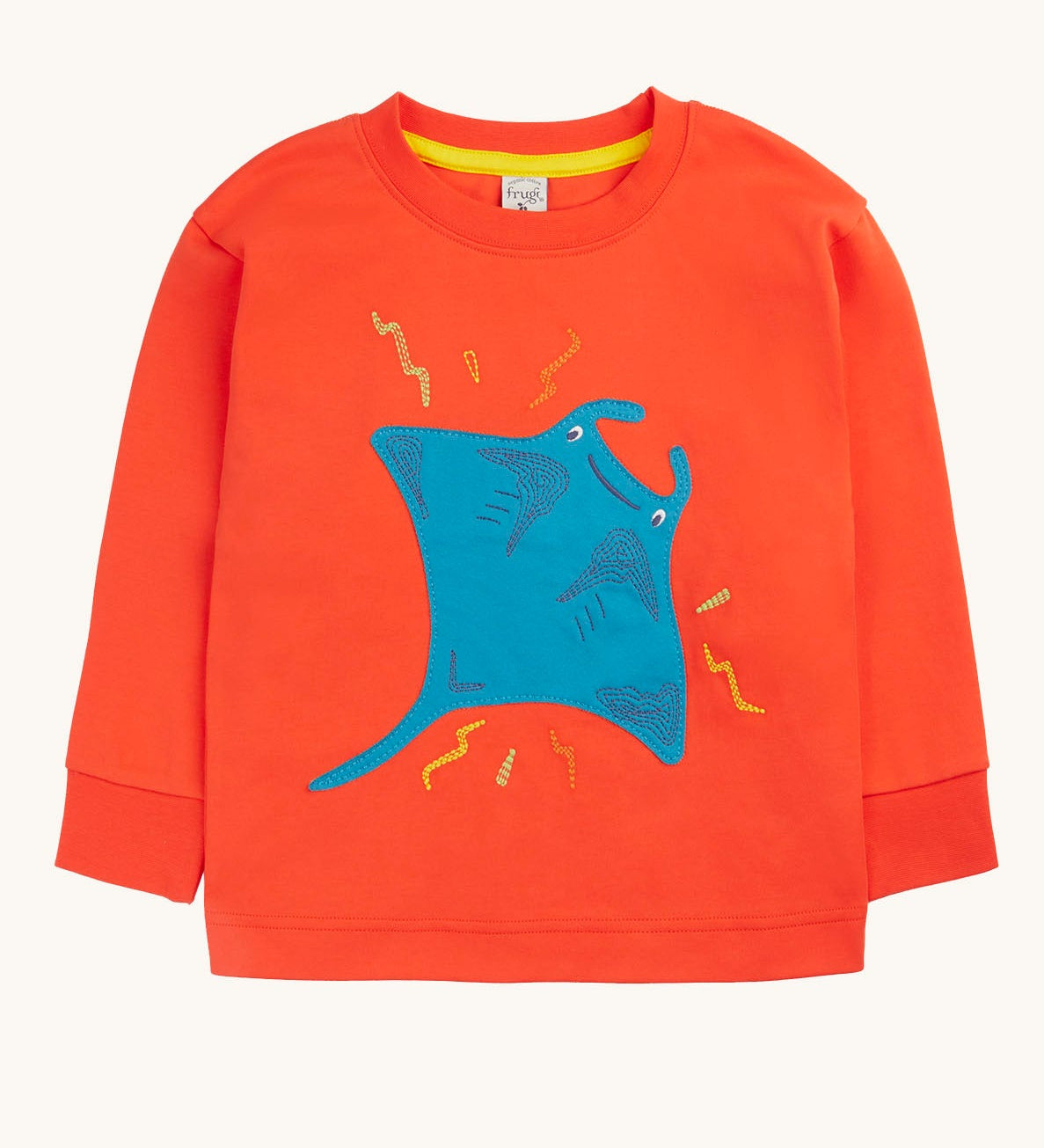 Frugi orange children's jumper with a large blue coloured ray applique on the front. 