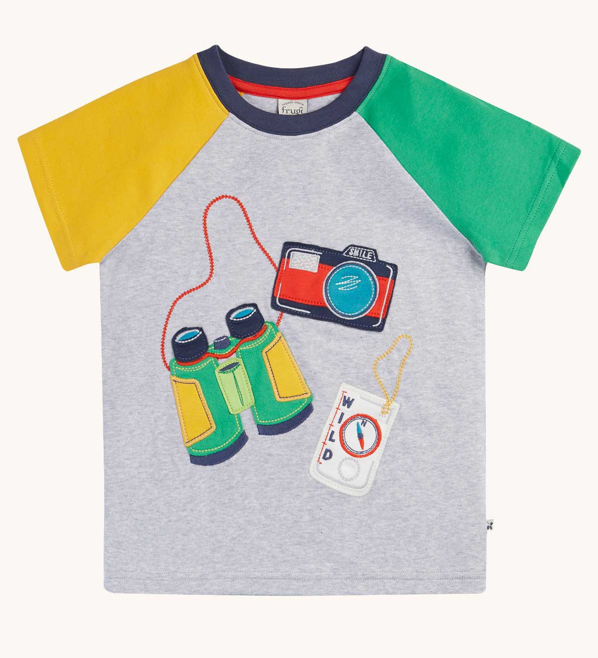 Frugi raglan t-shirt in a grey marl colour with one green and one yellow sleeve and an adventure themed applique design on the front featuring a pair of green binoculars, camera and a wild card compass. 