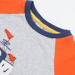 A close up of Frugi Renny Raglan T-Shirt in Grey Marl, featuring orange sleeves with a navy collar.