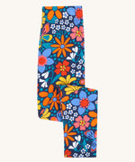Frugi Retro Floral Leona Organic Cotton Kids' Leggings. A navy coloured legging with a bright multicoloured retro style flower print all over. These leggings are part of a wide range of organic cotton clothing for children available here at Babipur. 