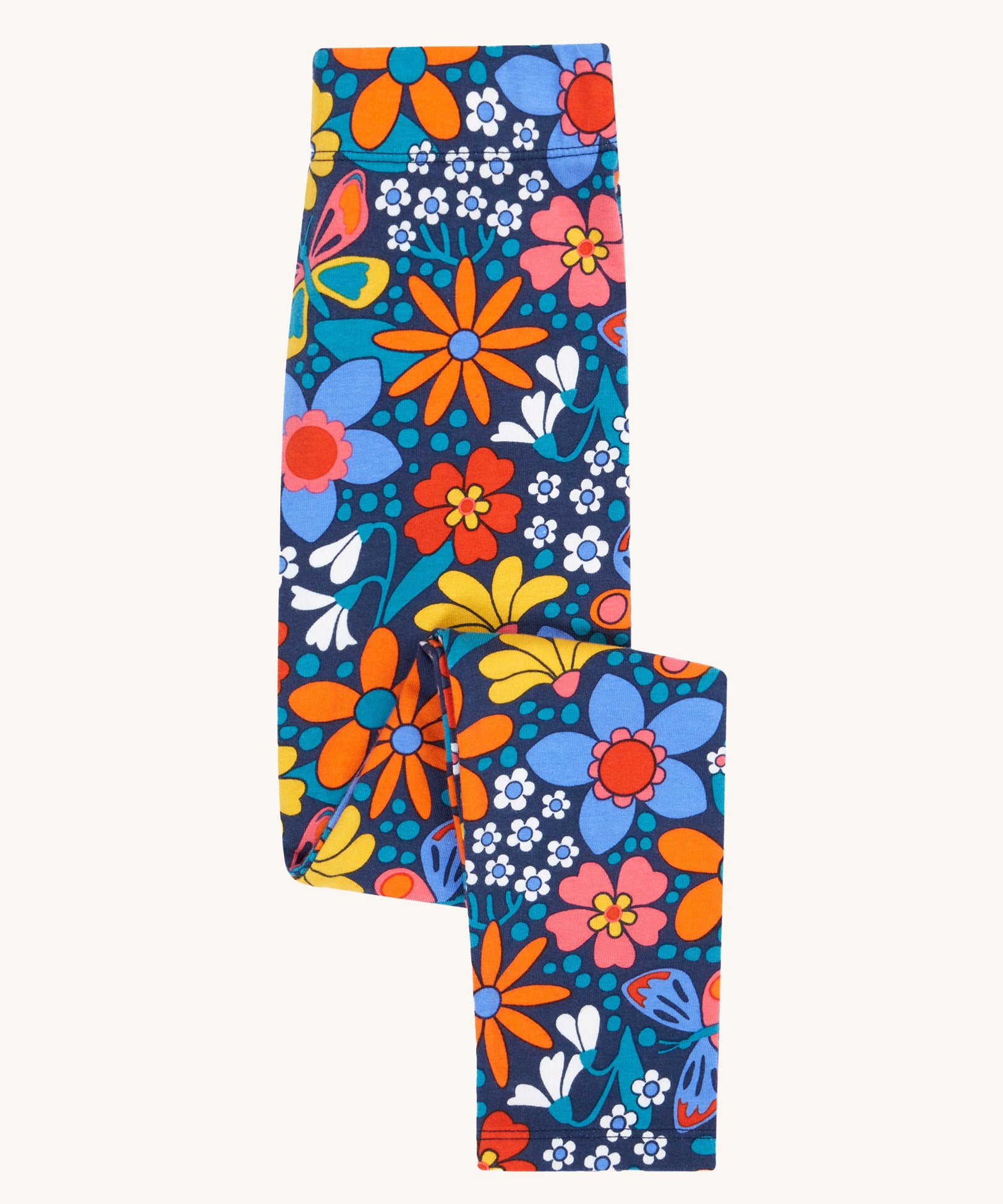 Frugi Retro Floral Leona Organic Cotton Kids' Leggings. A navy coloured legging with a bright multicoloured retro style flower print all over. These leggings are part of a wide range of organic cotton clothing for children available here at Babipur. 