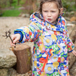 A child wearing the Frugi Children's Snow & Ski Coat - Retro Happy